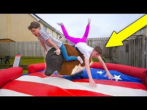 Last To Fall off MECHANICAL BULL Wins $10,000 - CHALLENGE!!