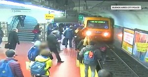 Watch commuters in Argentina help save woman who fell onto the tracks