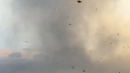 Incredible video shows "smokenado" spawned by corn field fire