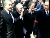 Pallbearers carrying coffin of Charlie Kray along MS Reggie Kray...