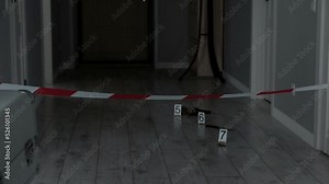 Forensic forensic scientist collecting evidence at a crime scene