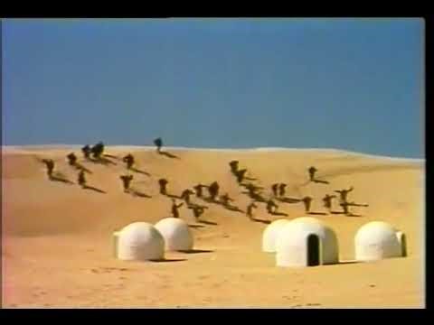 alien monsters attack a peaceful desert village