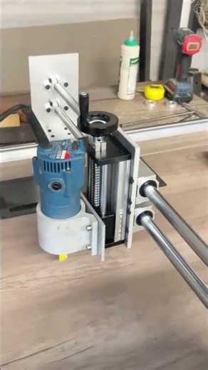 Blue router glides smoothly on linear rail system