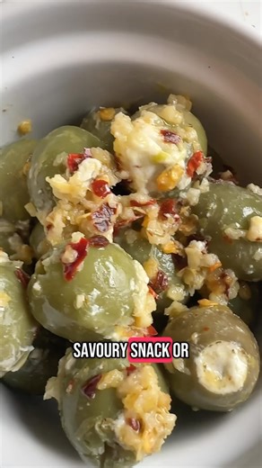 Madelyn Varela on Instagram: "Humboldt Fog Stuffed olive recipe! About 20 Castelvetrano olives 4 oz of Humboldt Fog from @cypressgrovers Vodka or olive brine 3 cloves of crushed garlic A pinch of red pepper A pinch of dried oregano Zest from one lemon A bit of lemon juice A pinch of salt A good drizzle of olive oil #cheese #cheesemonger #cheeselover #reels #viral #olives #recipe #martini"