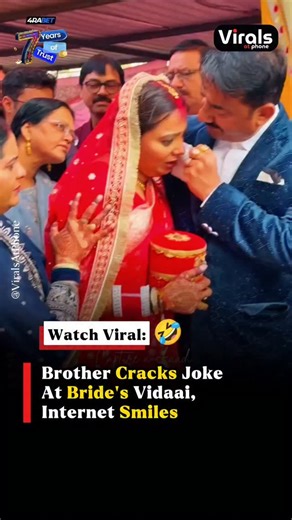 Virals At Phone on Instagram: "Indian weddings are known for loud music, bright outfits and heavy emotions. One moment that always melts hearts is the bride’s vidaai, the time when she says goodbye to her family and leaves for her new home. It’s usually filled with tears, tight hugs and emotional goodbyes. But sometimes, in the middle of all that crying, something unexpected happens that makes everyone laugh. A recent viral video from this wedding season shows exactly that. The clip was recorded