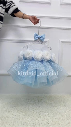 ✨ Give her the spotlight she deserves! This KLFFLGID fashionable floral off-shoulder princess dress is designed for birthdays, pageants, photoshoots, and every moment worth celebrating 🎉 Handcrafted 3D floral appliqués shimmering sequins = an unforgettable luxury look 💎 The soft layered tulle keeps her comfortable while still creating that dreamy, floating silhouette every little girl loves. 💙 Perfect for ages 0–12 — elegant, charming, and absolutely picture-perfect. Why moms choose KLFFLGID: