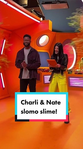 please enjoy 90 seconds of @charlidamelio & @nateburleson getting slimed 🤪💚 #kca #slime #behindthescenes #bts #slowmotion #slomo #satisfyingvideo