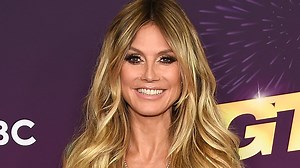 Heidi Klum is a busty bombshell in low-cut dress at AGT live show
