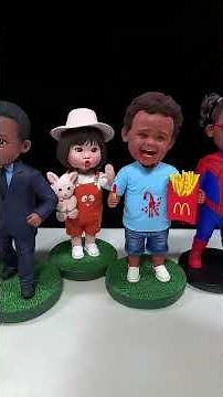 Cute Handmade Clay Bobbleheads Shaking Together