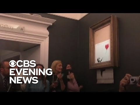 Banksy painting self destructs after $1.4 million sale