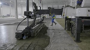 Observe the Innovative Concrete Laying Equipment Effectively Engaged in Action Today. Clip