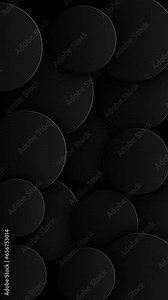 Vertical video - dark abstract geometric background with gently moving black spheres. This black minimalist background is full HD and a seamless loop.