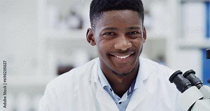 Science, research and face of black man with microscope, smile and medical engineering in laboratory. Biotechnology, study and pharmaceutical innovation, scientist or lab technician with analysis