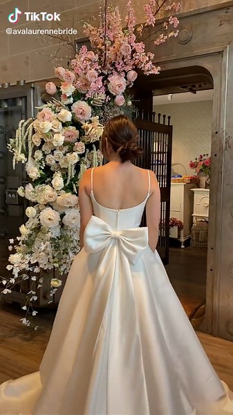 Elegant, romantic, and finished with a bow🎀 #bridalshop #wedding #bridetobe #weddingdress #bridal #bridal #bridalgown