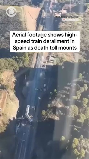 Aerial footage from Spanish authorities shows damage after two high-speed trains derailed in Adamuz, Spain, and killed at least 39 people on Sunday night. https://cbsn.ws/3YME5jO | CBS News