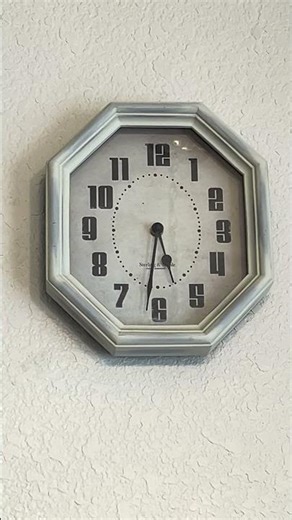 Small spider running across a wall clock | #shorts