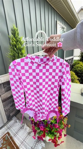 Cute, comfy, and safe for sunny days ☀️ This affordable toddler swimsuit has such a fun checkerboard print, and a zipper for easy changes perfect for little beach and pool adventures! #AffordableKidsStyle #ToddlerSwimwear #BabyGirlSummer #CuteAndComfy