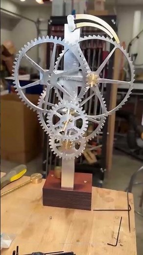 Watch a REAL clock mechanism come alive—hand-cut, filed & ticking.