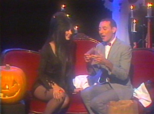 Pee-wee Herman on Instagram: "Just 1 week ’til Trick or Treat! 🎃🍬 🎥 Elvira, Mistress of the Dark & Pee-wee in her Halloween Special, 1982 @therealelvira"