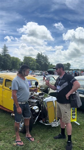 Crazy Larry's Yellow Hot Rod Showcased at Car Show
