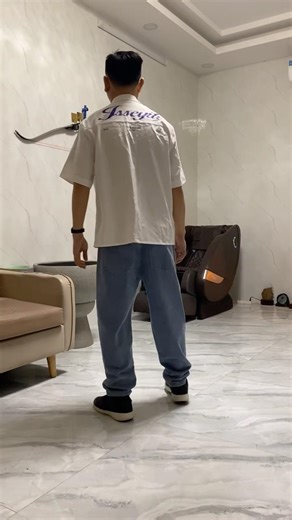 handsome guy trying on clothes