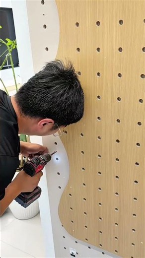 The pegboard installation looks amazing in home entryway. #pegboard #walldisplay
