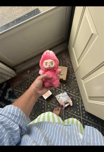 Opening a Labubu is a tiny burst of joy that feels bigger than it should. You peel back the box like it’s a secret you’ve been trusted with, fingers fumbling with anticipation. There’s that faint, plasticky scent of a new toy—and then the crinkle of the foil pack, sealed tight like a treasure chest. For a moment, you hesitate. What if it’s the one you’ve been hunting? What if it’s not? But that’s the magic—Labubu never disappoints. You tear it open and there it is: a little goblin of chaos and c