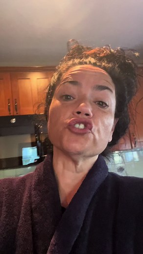 Captivating Kitchen Moments in a Dark Purple Robe