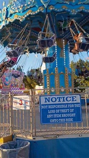 Jace on the kids swing ride at the fair | Michael Winkler | Facebook