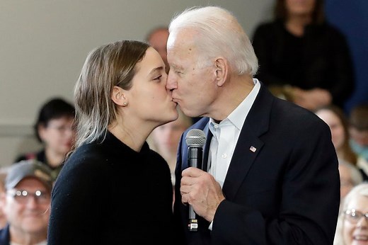 Joe Biden kisses granddaughter on lips during Iowa rally