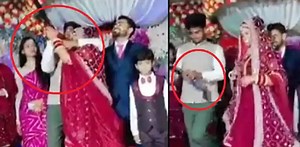 Viral: Bride fires gunshot in air on stage at wedding reception