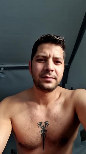 Stylish Tribal Bird Tattoo on Muscular Chest