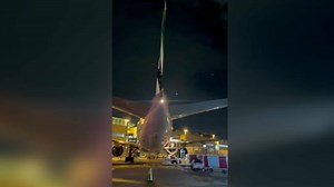 Two Planes Clip Wings at Miami International Airport