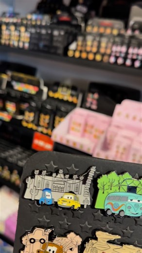 Get Ready Comics on Instagram: "Unboxing Cars Pins with Alaina!✨ This may be our favourite ever unboxing reel! 📍 “From Flo’s V8 Café to the Cozy Cone, collect a little piece of Pixar magic!” In Stock Now - This Exclusive @Loungefly Pixar Cars Blind Box Pin set features iconic spots and characters from the Cars universe. With 6 adorable designs featuring McQueen, Mater, Flo, and more. Limited In EMEA - USA - @boxlunchgifts LE : 768 In EMEA Full box size - 12 £6.99 each or 4 for £24 & £6 each aft