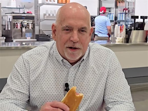 Costco's CEO chows down on a $1.50 hot dog combo in the latest riff on the McDonald's burger meme