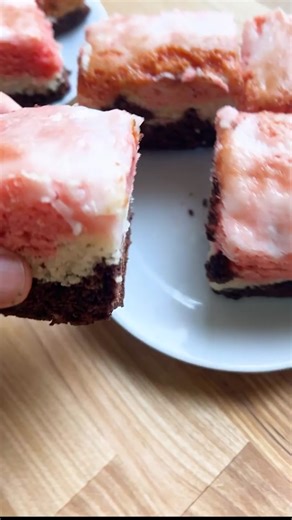 These Neapolitan Bars are a cinch to whip up and a total crowd-pleaser! Watch as we layer on the goodness with chocolate, vanilla, and strawberry cake mixes, topped with a luscious coconut milk drizzle! 😋🥥 Perfect for spring parties or a sweet treat any time! #NeapolitanBars #DairyFreeDelight #EggFreeEats #SpringSweets #EasyRecipes #VeganTreats #SweetToothSatisfied #PartyPleaser #NamelyMarly
