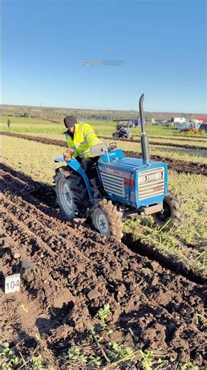 Iseki TU2100 utility tractor ploughing