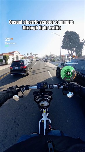 Casual electric scooter commute through light traffic