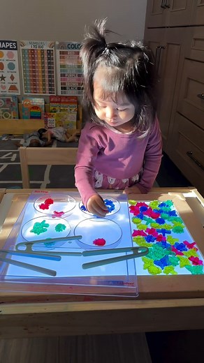 Here’s a bright idea—light tables and corresponding manipulatives are a great way to “spark” learning! 💡💙 From sensory fun to counting, patterning and more—there’s tons of ways to use these kid-favorite items to illuminate young minds. ✨ 🎥: @Alexxiejiggs Explore light tables and accessories: https://bit.ly/3uAaLBy. | Lakeshore Learning