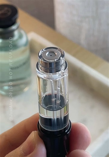 Stay fresh anywhere this summer with this refillable perfume atomizer. It uses pump to fill technology for quick refills and a secure design that does not leak inside your bag. Perfect for daily use and travel. #perfume #decants #atomizer #perfumetok #travelessentials