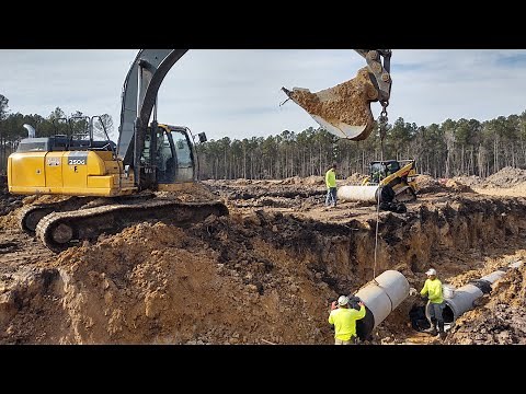 Laying 24" Concrete Pipe For Storm Drainage