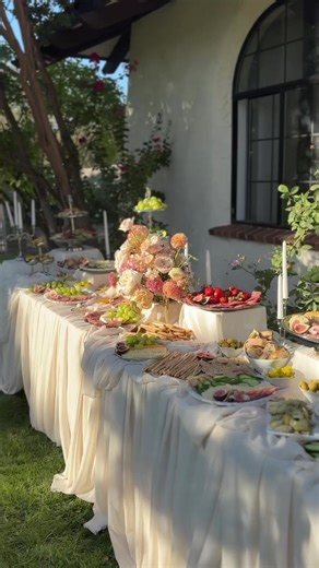 Wedding grazing table drapery setup with silver platers. #drapery #weddingtok #weddingideas #grazingtable #sacramentoweddings