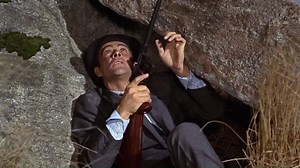 Bond is attacked by a SPECTRE helicopter in FROM RUSSIA WITH LOVE (1963). The scene was filmed in Lochgilphead in Scotland where shooting was hampered by bad weather. | James Bond 007