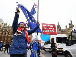 May to address MPs as historic Brexit vote is called off