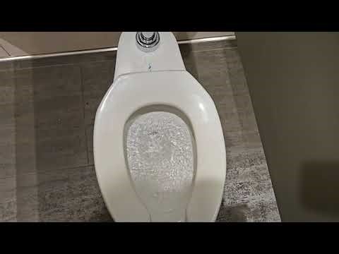 Office Building Men's Restroom with Crane Fixtures