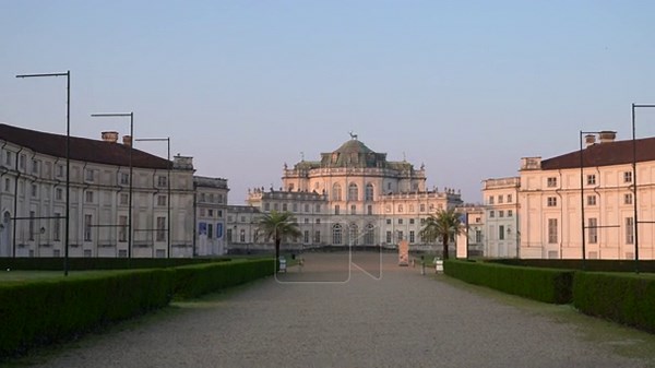 Stupinigi, turin, italy. March 23, 2026. Gradual zoom revealing the majestic facade of the palazzina di caccia of stupinigi. The baroque architecture glows at sunset Stock Video Footage - Alamy