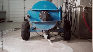 carpet in automatic washing machine and pouring water. Laundry service