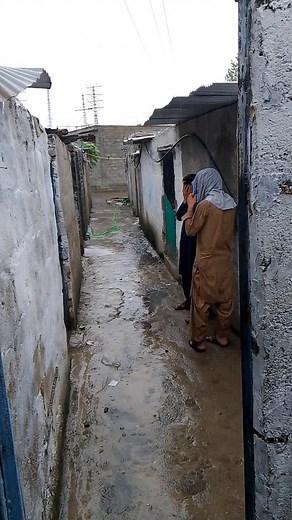 Exploring Traditional South Asian Attire in Urban Alleyway