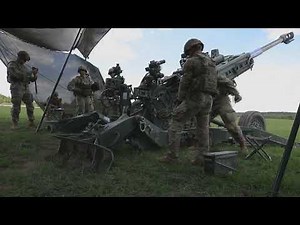 Soldiers from “Archer” Battery, 2nd Cavalry Regiment Fire the Howitzer