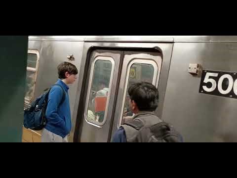4/23/2026 125th Street bound Q and Ditmars Boulevard bound W trains at Times Square-42nd Street (PM)